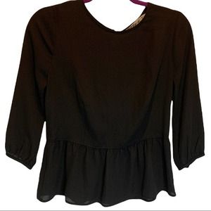 CHLOE K black peplum top. Zippered back down to peplum. Scoop neck. Size small